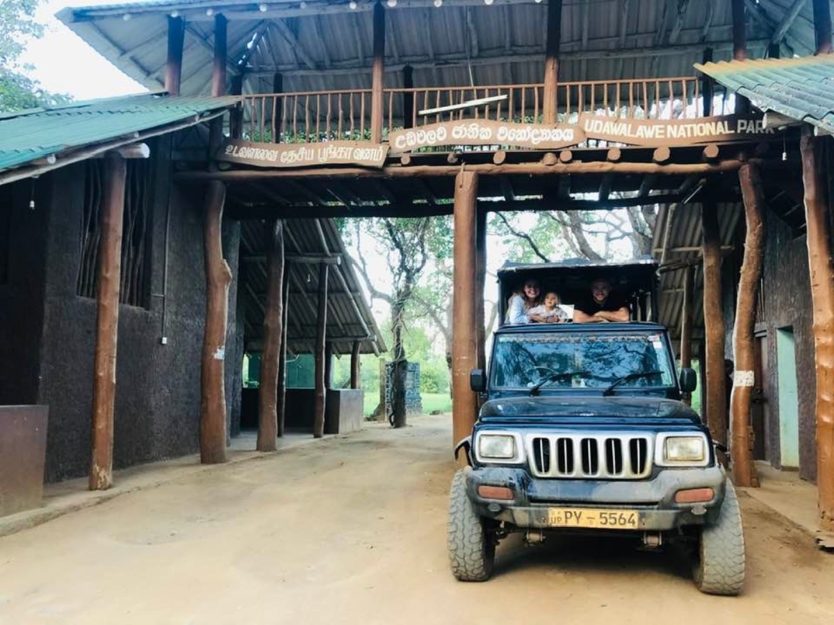 udawalawe Safari jeep udawalawe national park entrance with happy guests.jpg